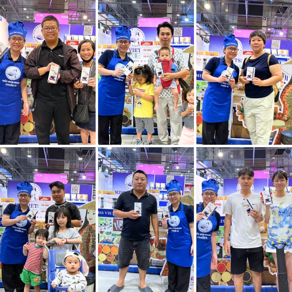 Delighted Supermarket Shoppers Receiving Buy 1 Get 1 Promo Gifts At The Miss Vietspice Booth